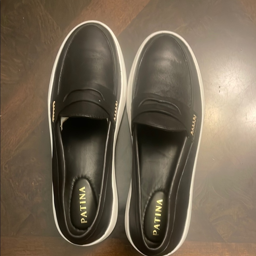 Black Loafers with Ventilation Holes and Slip-On Design